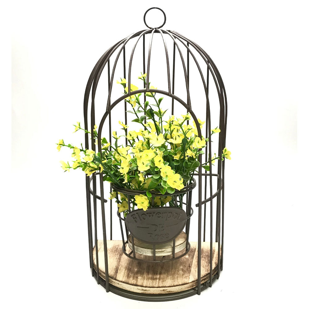 Cage d'oiseaux avec décoration de fleurs